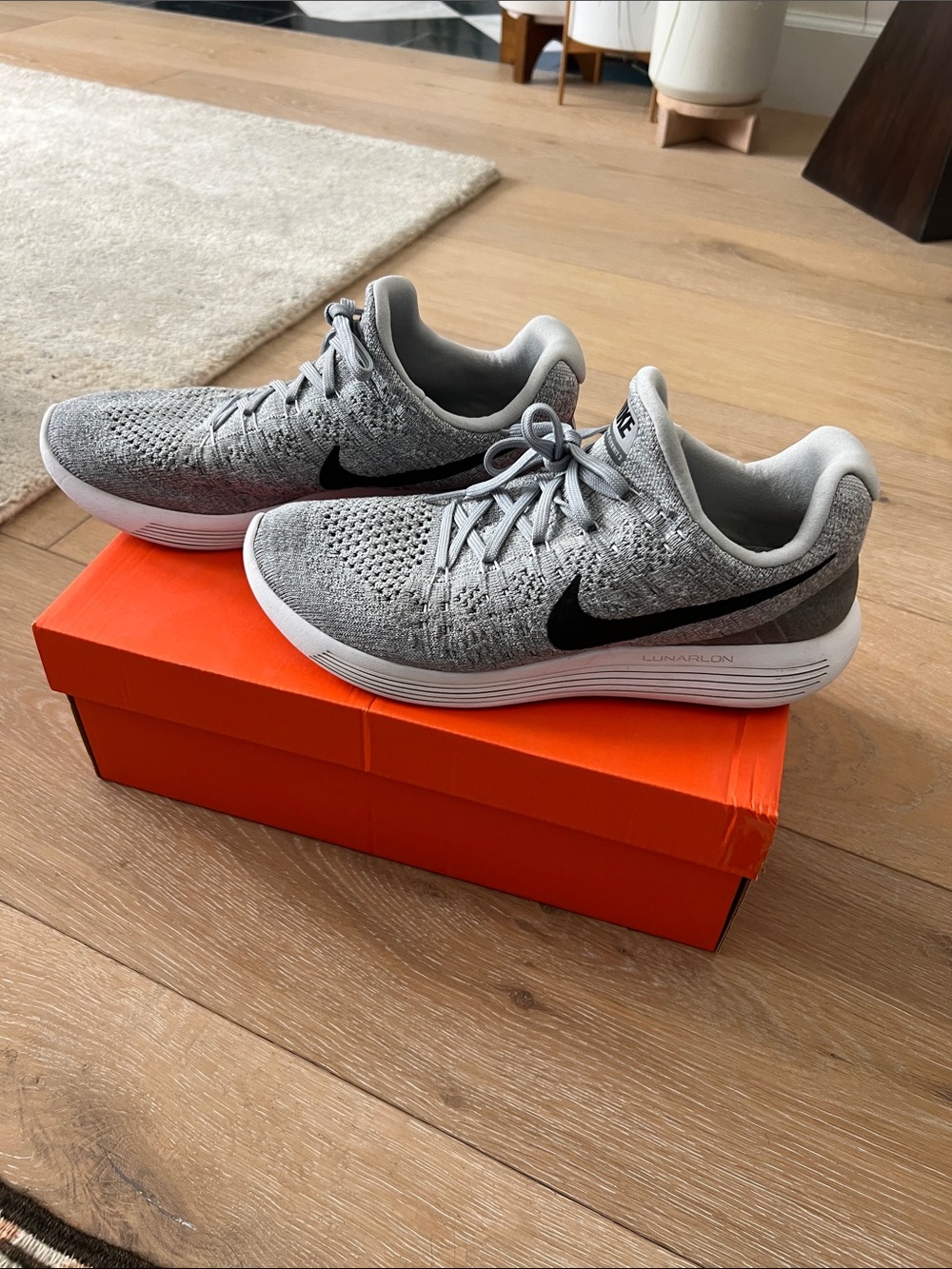 Nike Gray Flyknit Running Sneakers with Black Swoosh